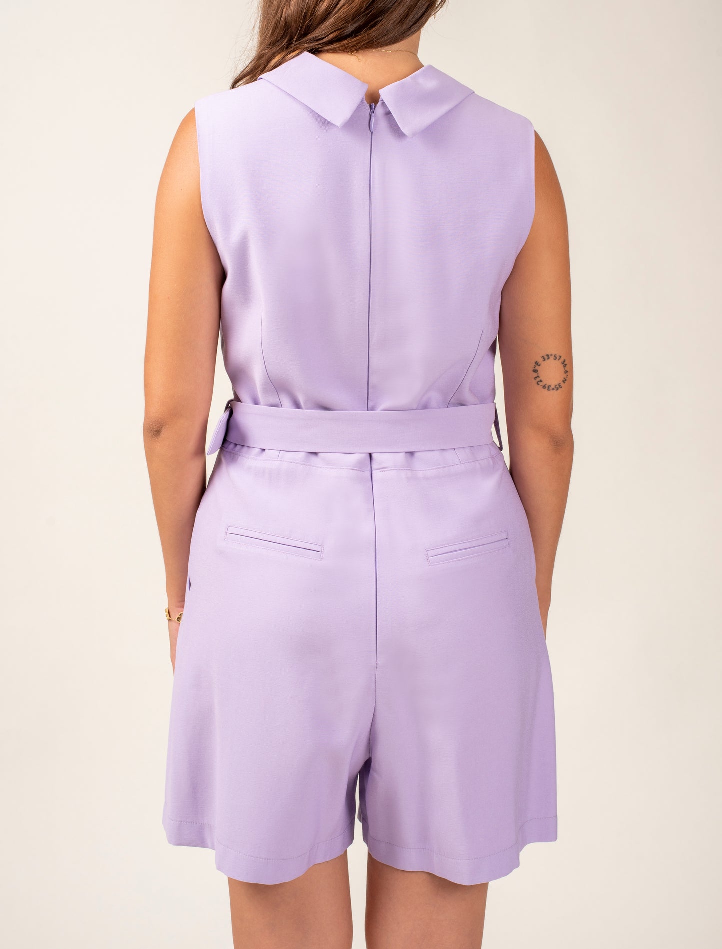 Sleeveless Short Jumpsuit Featuring Shawl Lapel and a Waist Belt