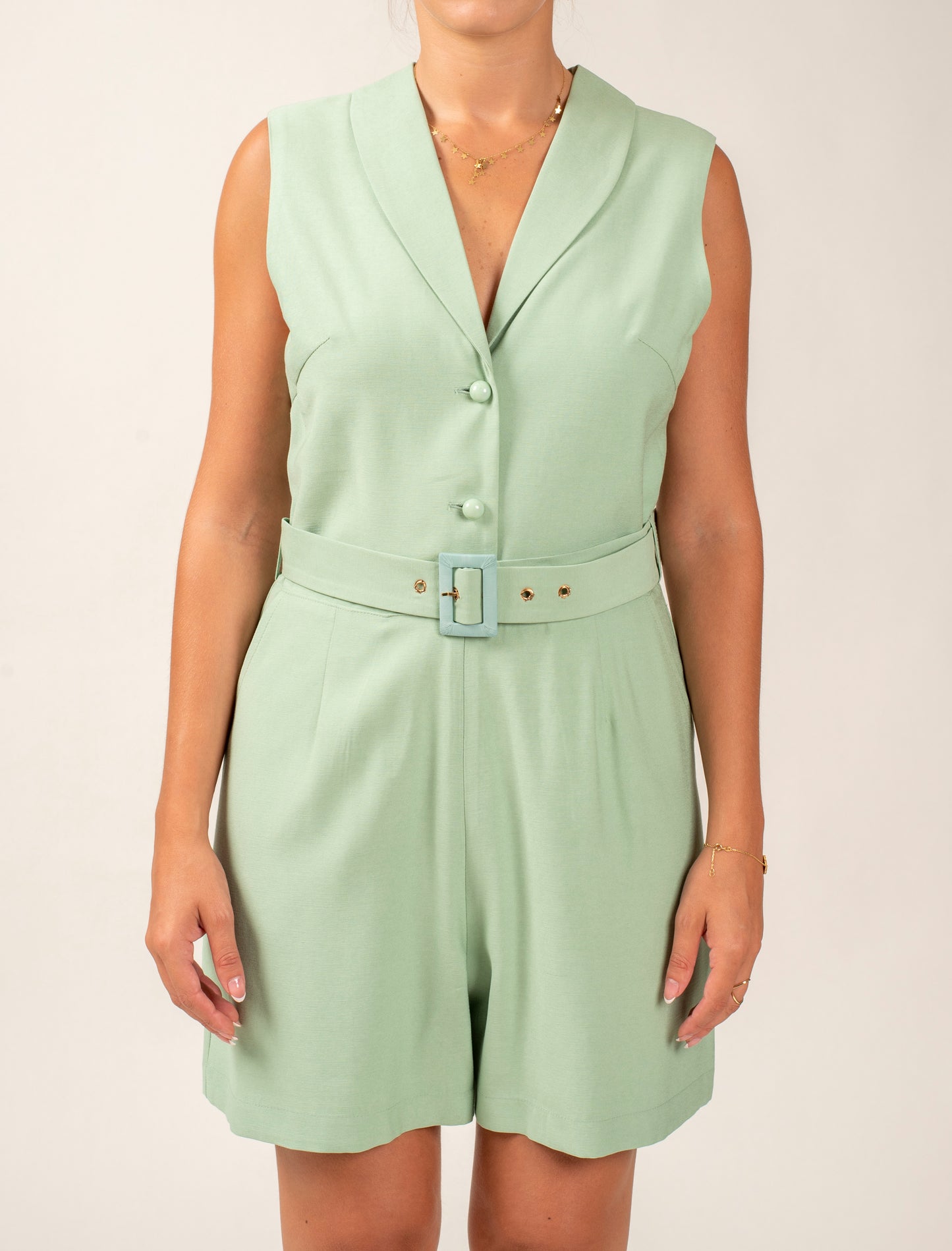Sleeveless Short Jumpsuit Featuring Shawl Lapel and a Waist Belt