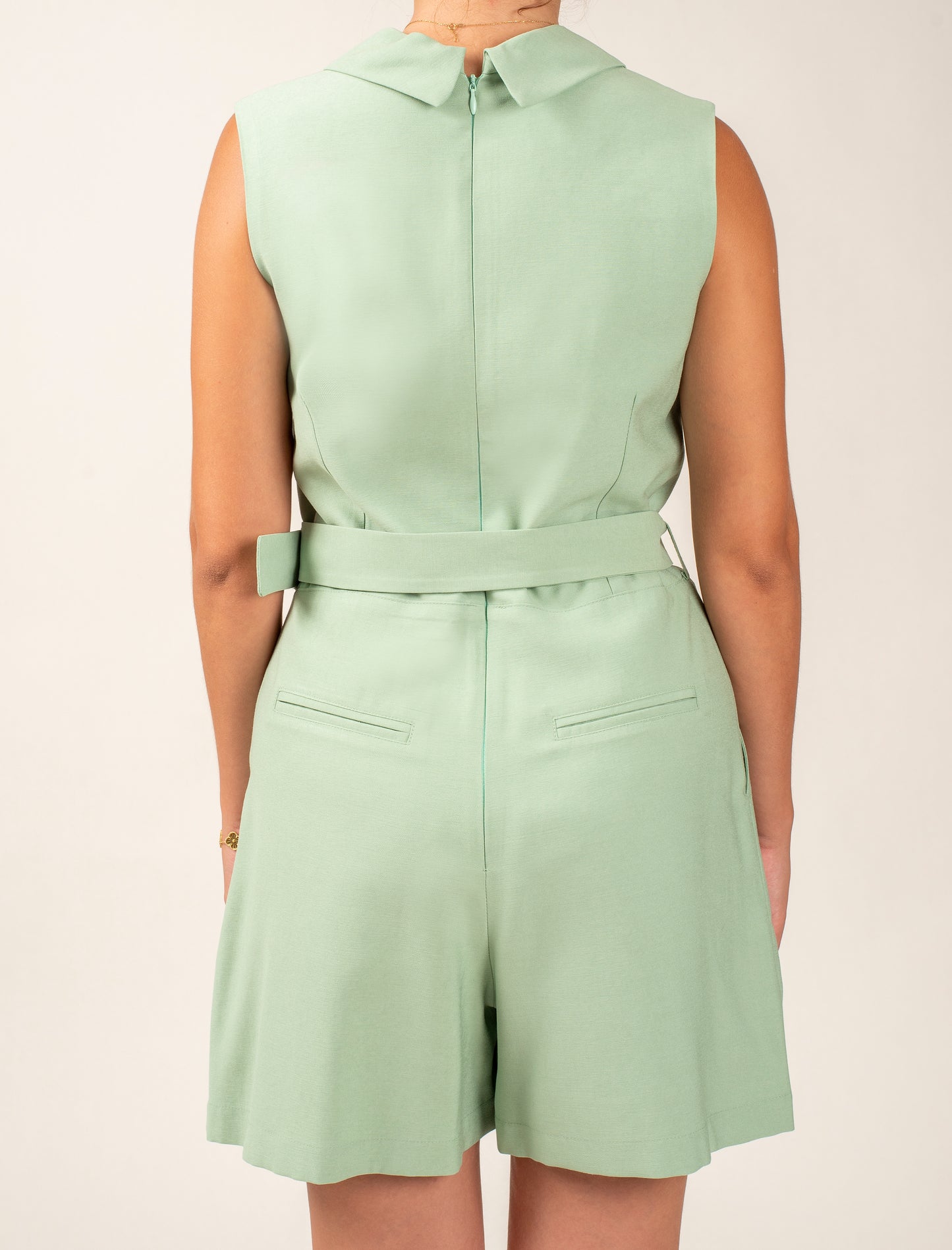 Sleeveless Short Jumpsuit Featuring Shawl Lapel and a Waist Belt